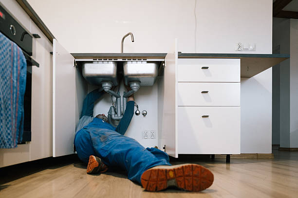 Professional Drain Cleaning technician working in Russellville, KY